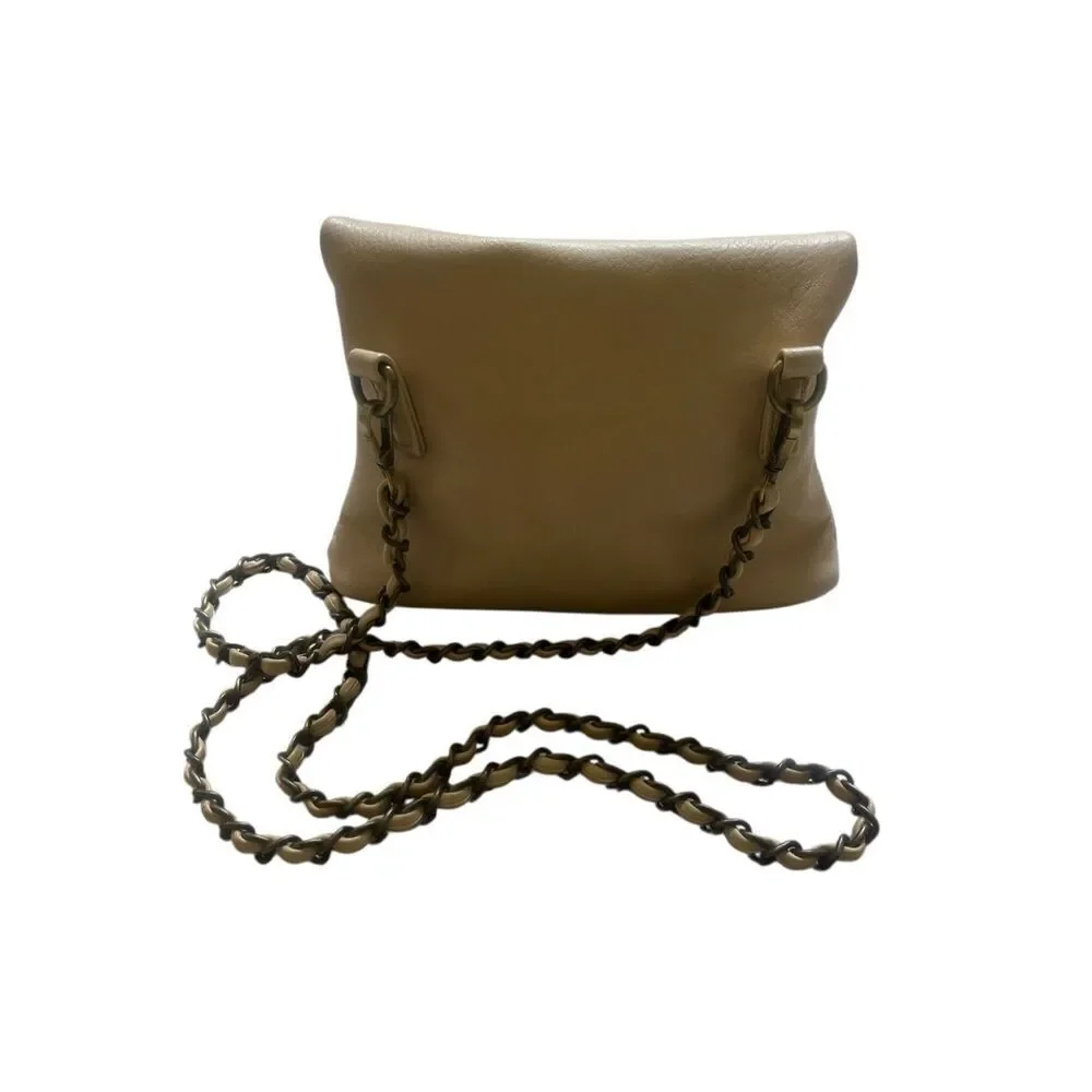 Anthropologie cross body fold-over purse beige/tan color